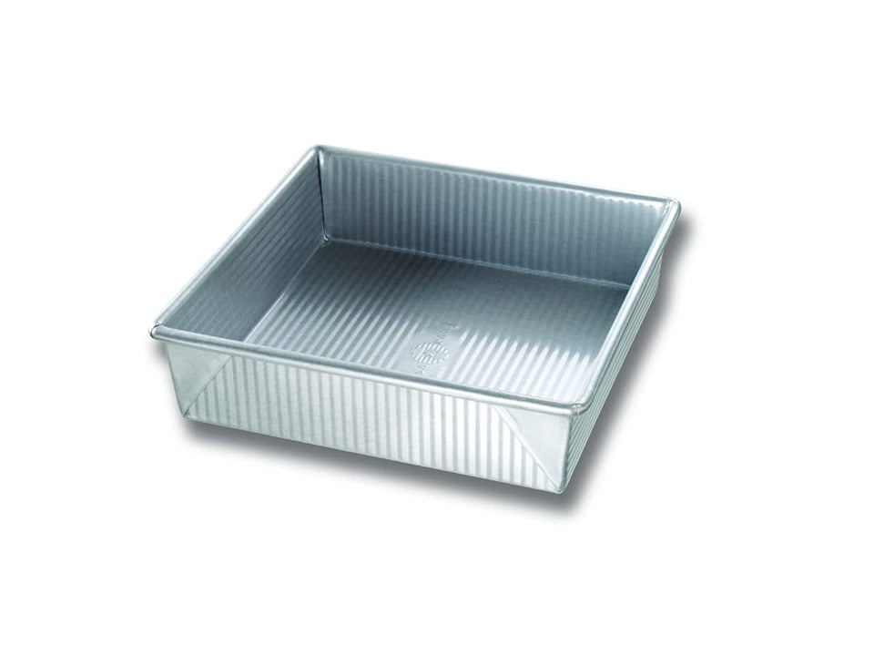 USA Pan square cake pan with corrugated surface for even browning and quick release.