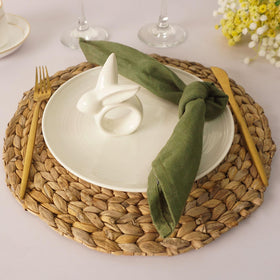 utalek easter table setting with colorful napkins and white bunny rings