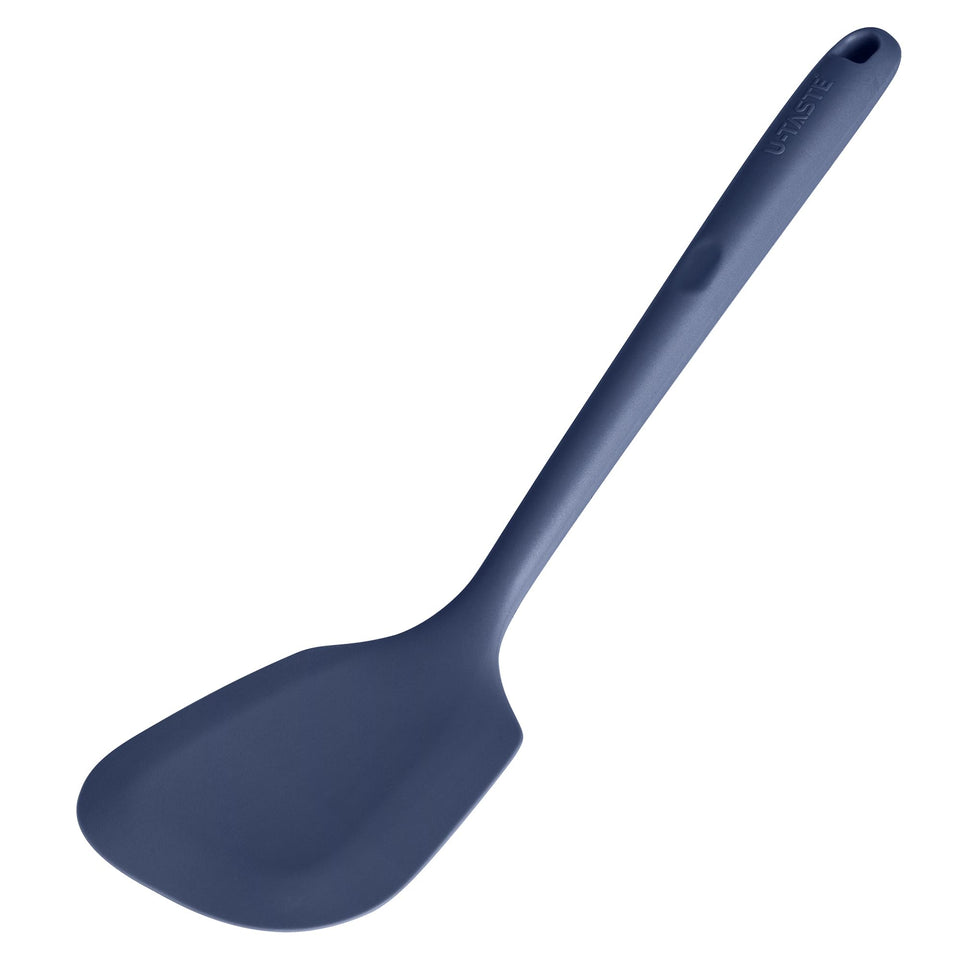 U-Taste 13-6in silicone turner, full view, perfect for flipping delicate foods on nonstick pans.
