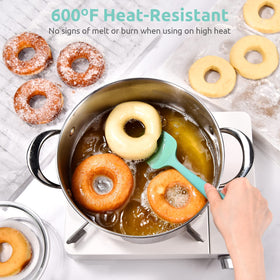 U-Taste silicone spoon scraping bowl for thorough cleanup.