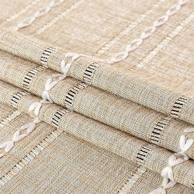Utobanh bedside tassel cover on table demonstrates stylish decor and easy spill protection.