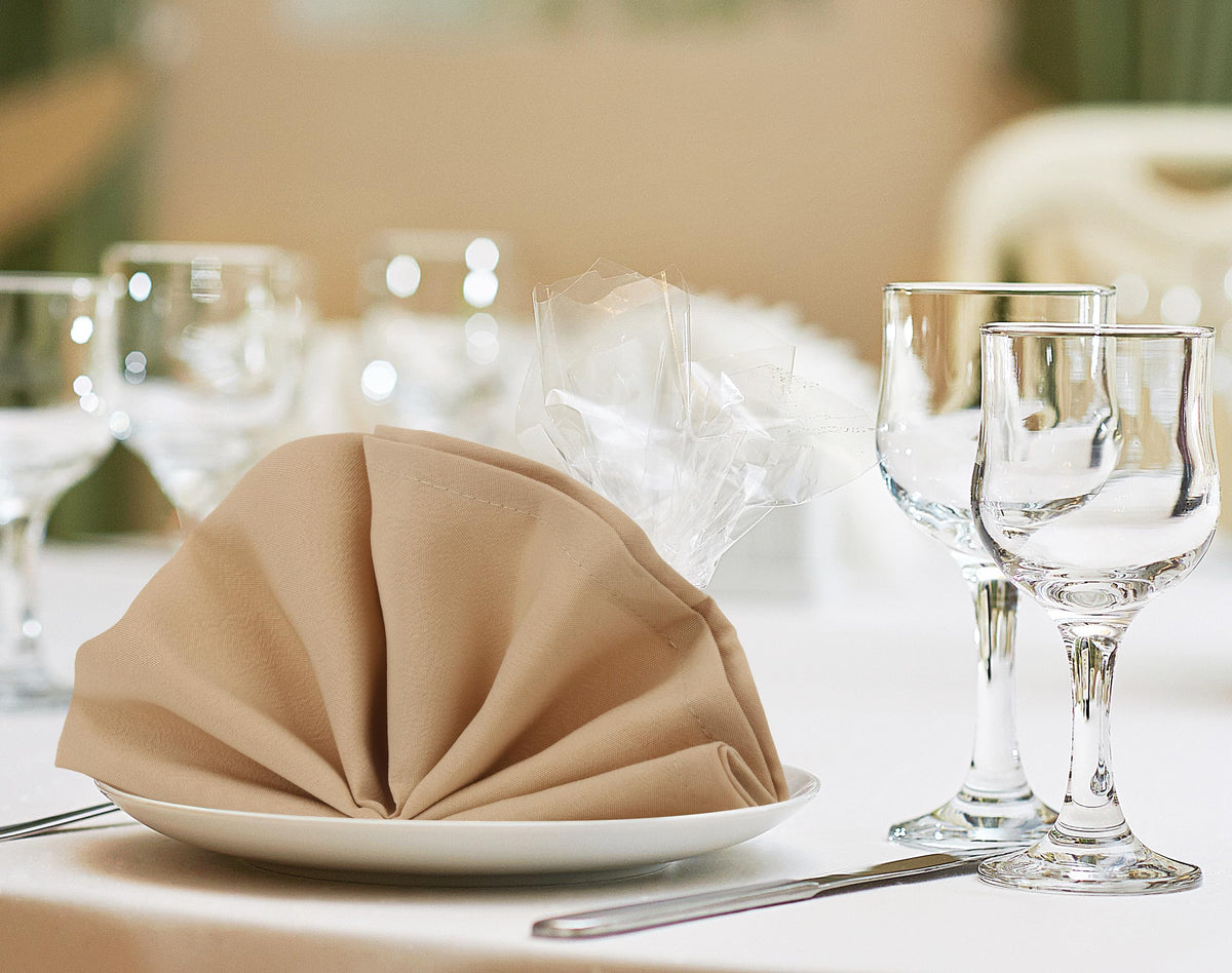 Utopia Home beige napkins illustrating full-coverage size for laps and place settings