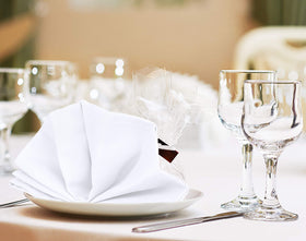 Icon indicating machine washable care for Utopia Kitchen napkins.