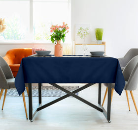Table setting for a wedding or event with navy blue Utopia Kitchen cloth.