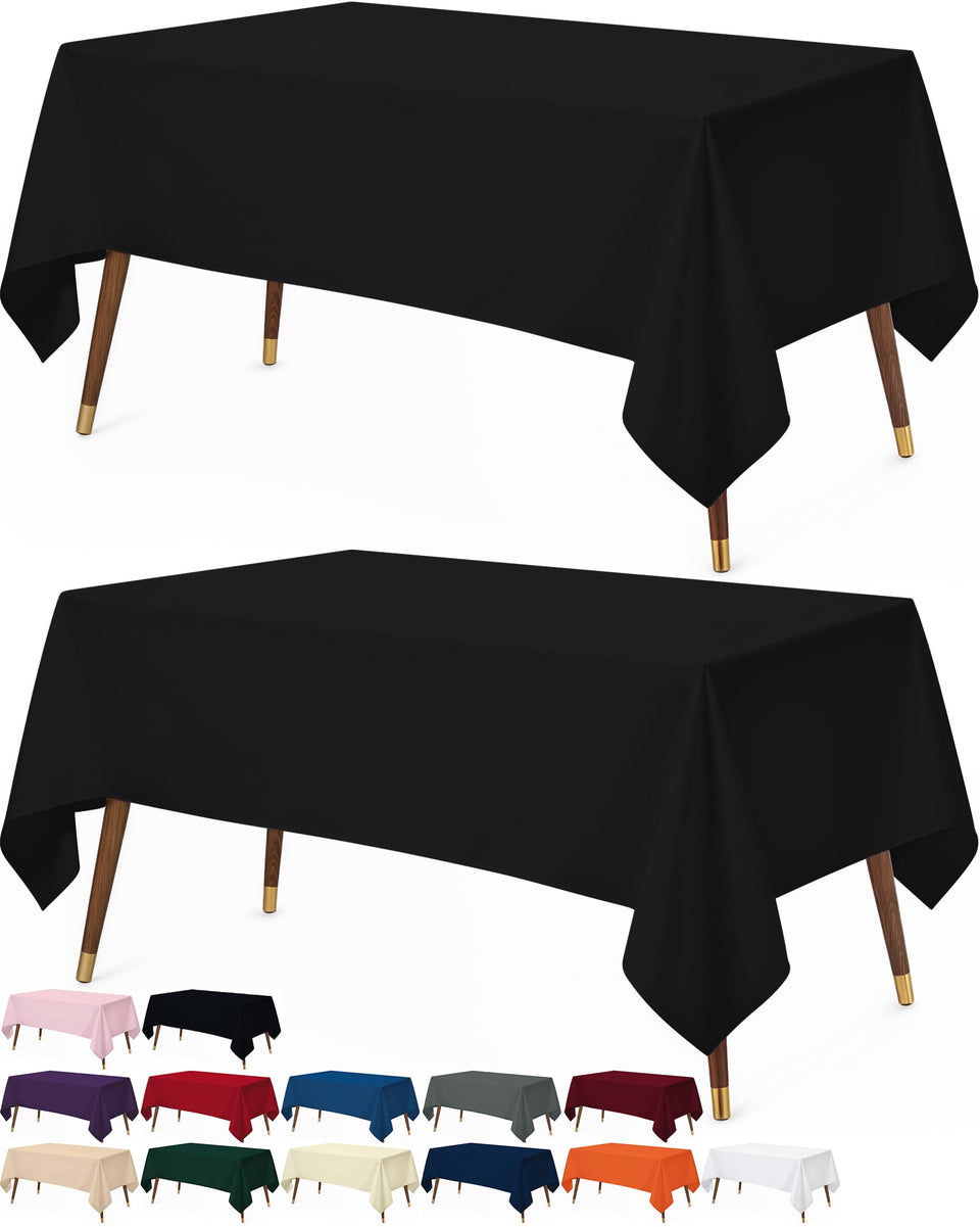 Utopia Kitchen rectangle table cloth 60x102 inches in black protects a dining table.