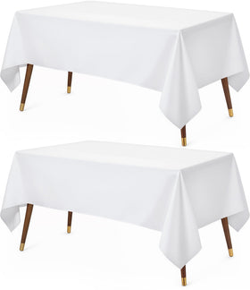 Utopia Kitchen rectangle table cloth in white protects surfaces during meals.