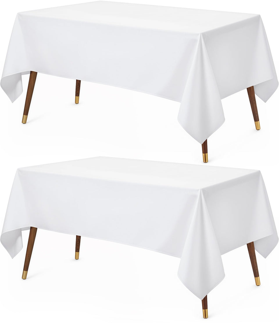 Utopia Kitchen rectangle table cloth in white protects surfaces during meals.