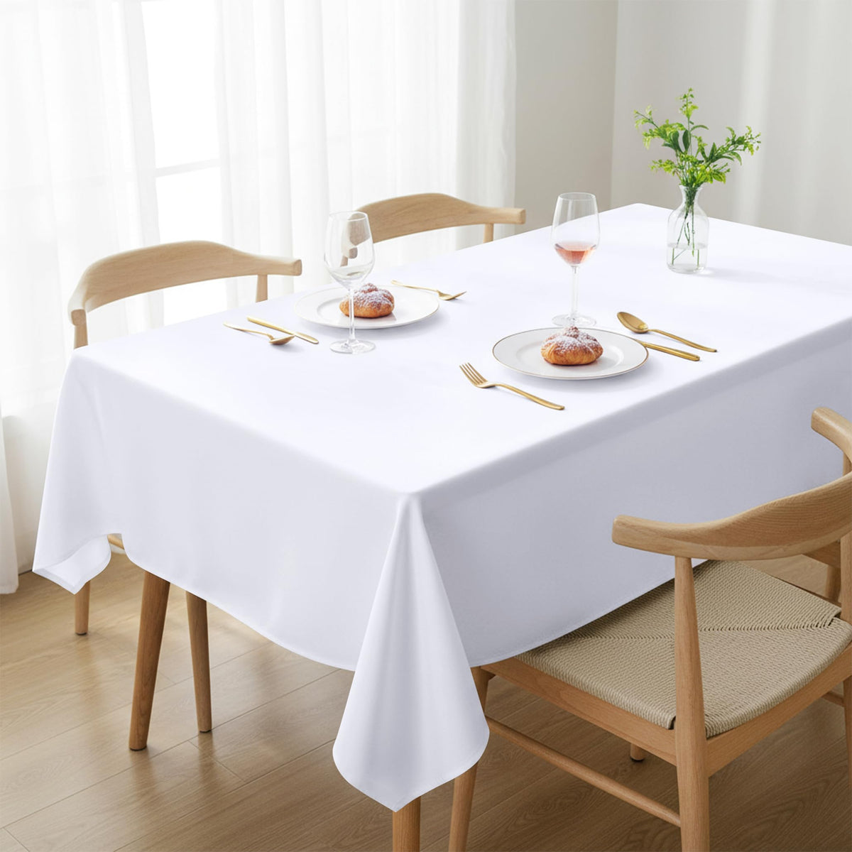 Utopia Kitchen rectangle table cloth 60x84 in white for polished dining surfaces.