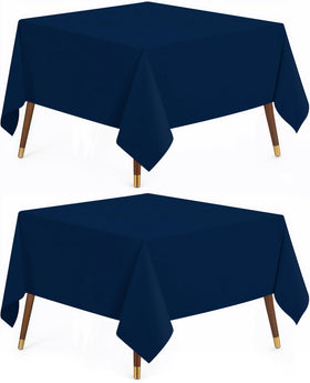 Utopia Kitchen navy blue rectangle table cloth on a 54x54 table enhancing dining ambiance.