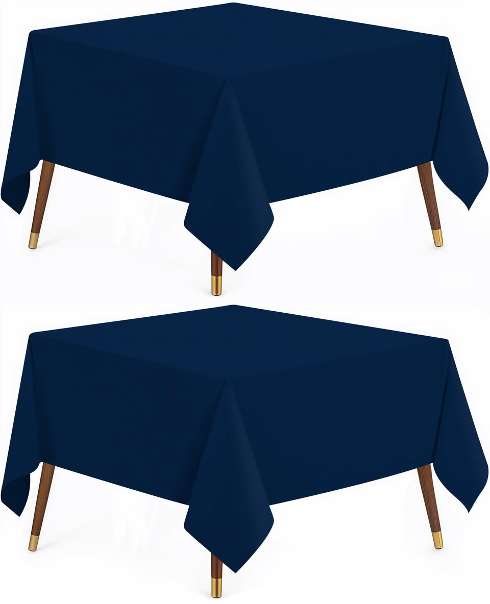 Utopia Kitchen navy blue rectangle table cloth on a 54x54 table enhancing dining ambiance.