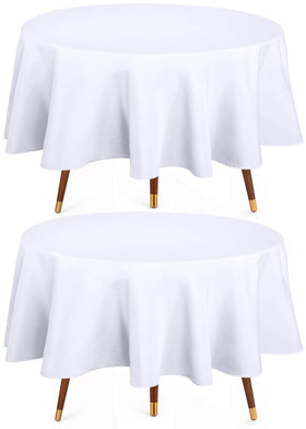 Utopia Kitchen round table cloth 90in white on a dining table for elegant family meals.