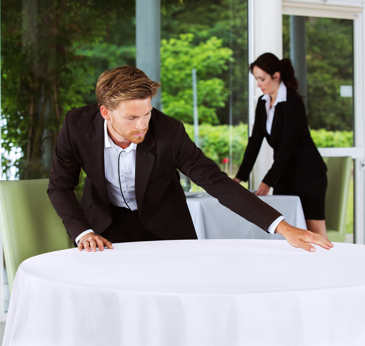 Utopia Kitchen round table cloth 90in white machine washable for easy care.