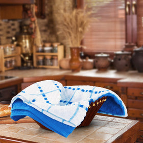 Utopia Towels blue color brightens kitchen decor.