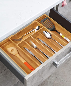 Utoplike bamboo tray for kitchen storage with compact, tidy arrangements.