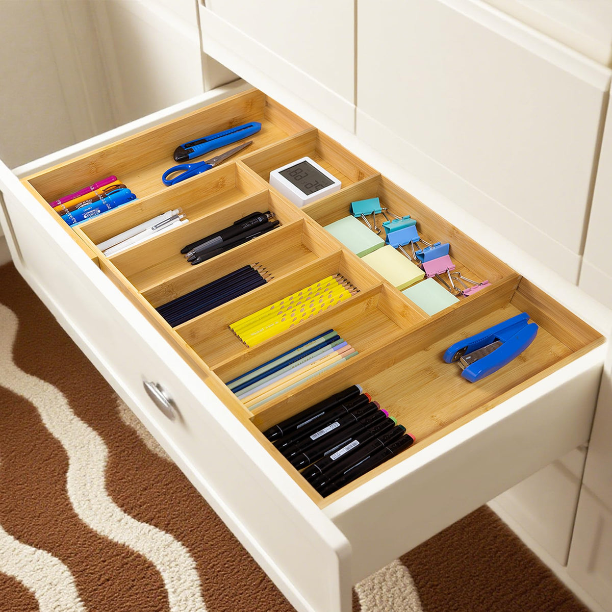 Utoplike bamboo tray cleaning with damp cloth maintains drawer neatness.