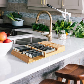Utoplike knife block stores sets out of sight while keeping knives sharp and protected.