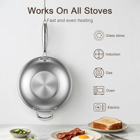 Uven Traoqq wok stay-cool handle for safe tossing and stirring.