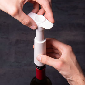 Vacu Vin wine preserver with pour-friendly design for standard bottles.