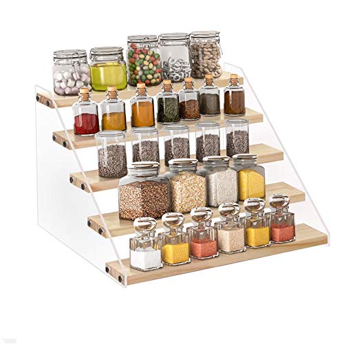 VAEHOLD 5-tier spice rack on countertop keeps bottles neatly arranged and accessible.