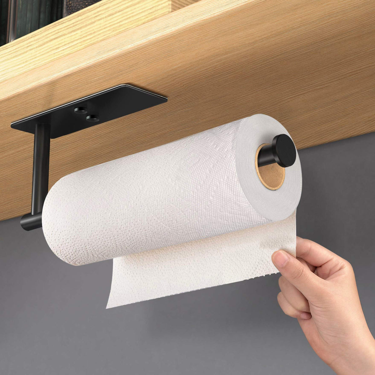 VAEHOLD under-cabinet mount keeps towels out of sight and saves cabinet space.