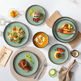 Vancasso AMBER turf green plates close-up showing kiln-transformed glaze color variations.