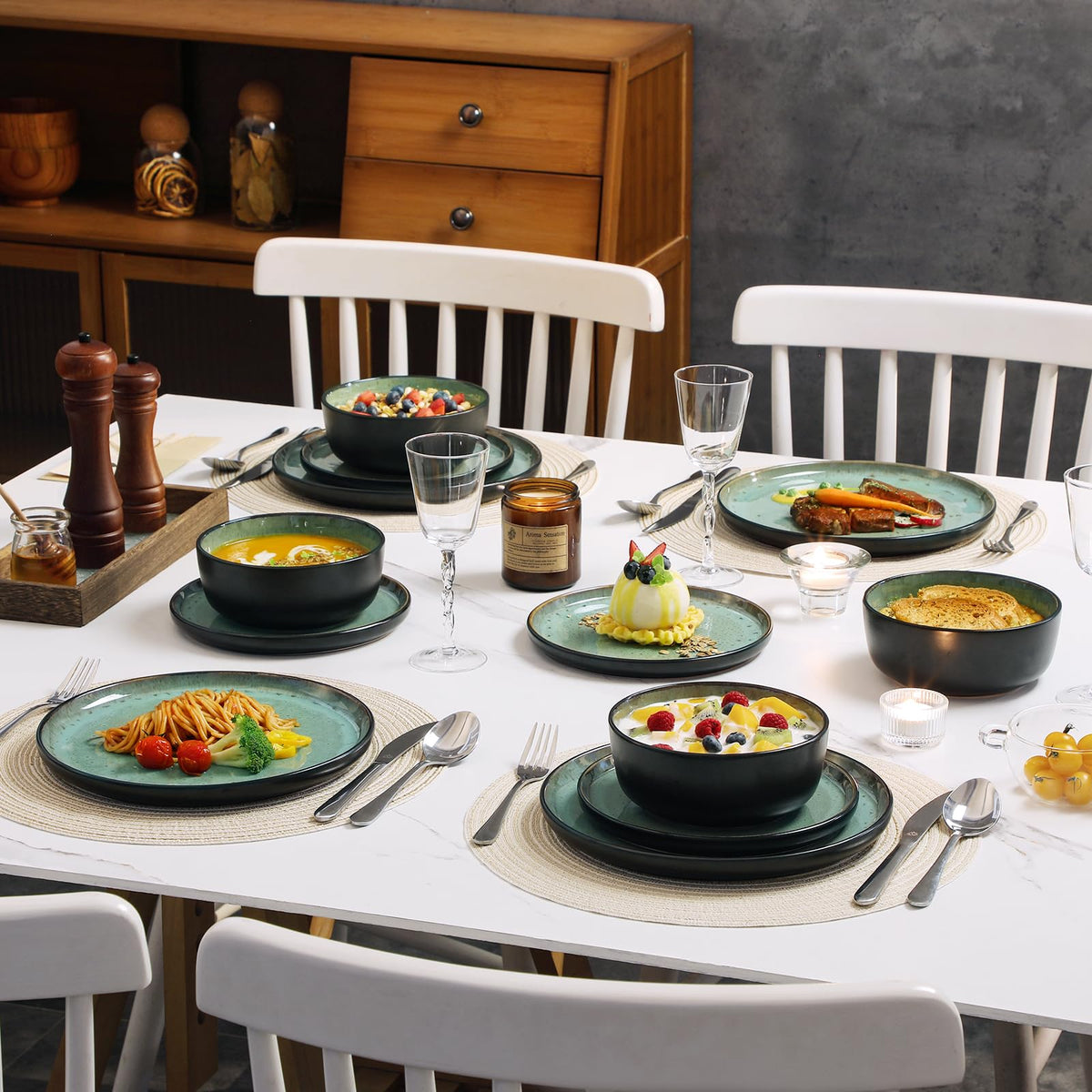 Vancasso Amber plates arranged for a dinner party show the turf green finish.