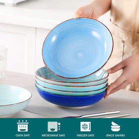 Vancasso Bonita blue bowls on table elevate dining presentation.