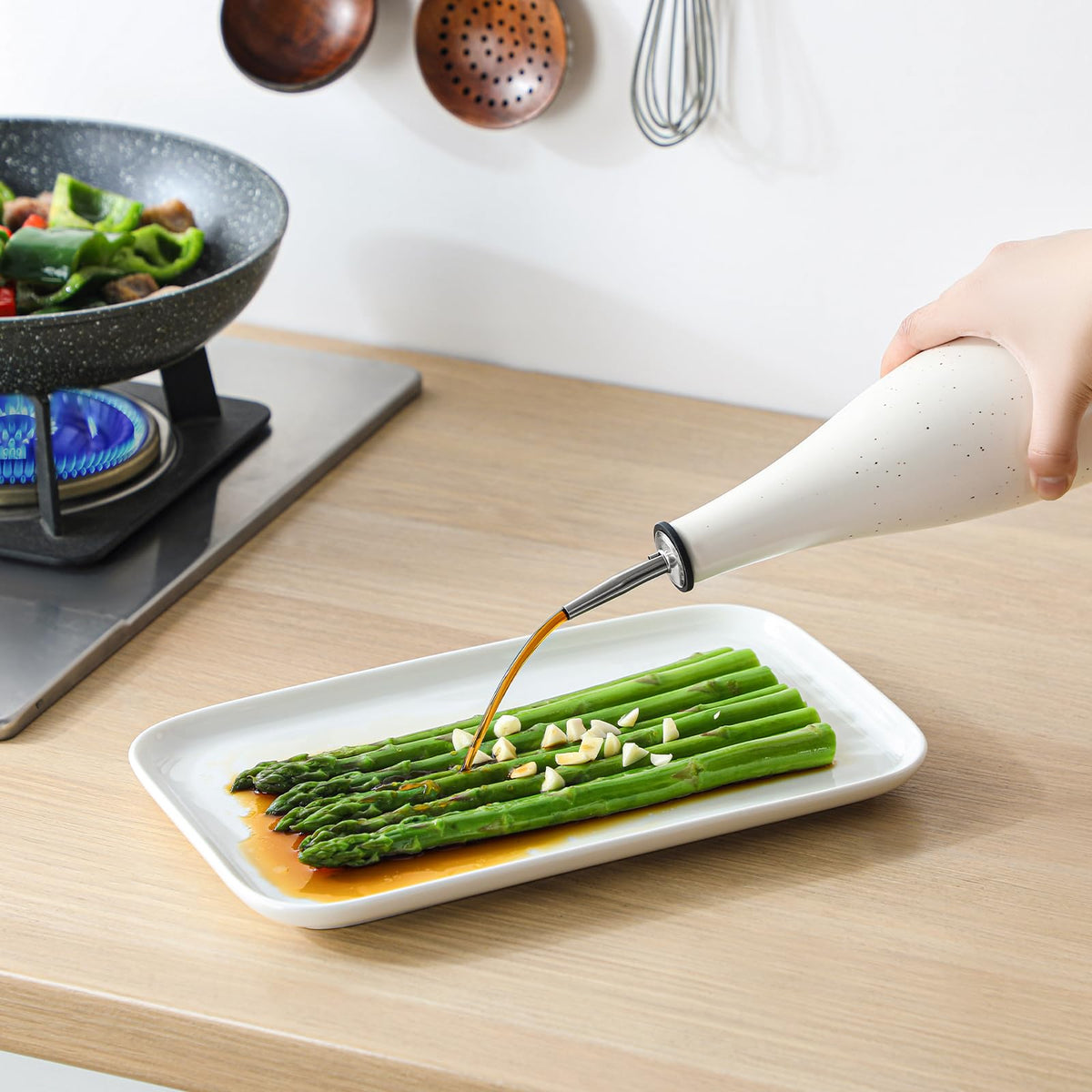 Handmade Vancasso ceramic bottle adds an artisan touch to your table