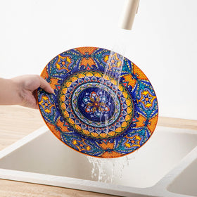 Vancasso KRVI table setting showcases rich colors and intricate patterns.