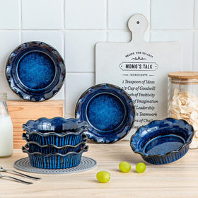 Vancasso pans shown ready for dishwasher, microwave, and oven use