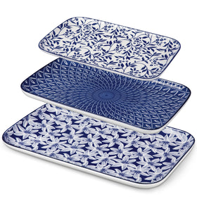 Vancasso Selene 16-inch serving tray displaying main dishes with a sleek, stackable silhouette.