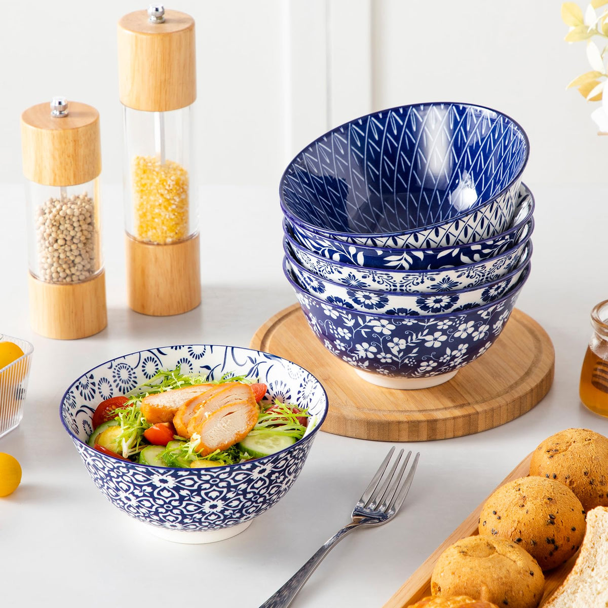 Vancasso Selene vivid blue-white glaze enhances table color.