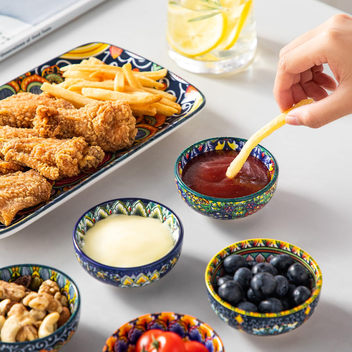 Vancasso SIMI boho-chic bowls add vibrant color to the table setting.
