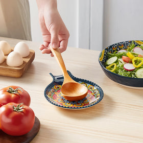 Vancasso spoon rest blue on kitchen counter supports rapid drying and mess reduction.