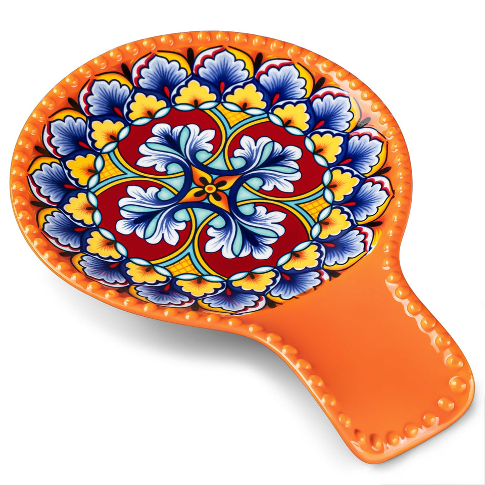 Vancasso orange spoon rest on stove-top adds color and counter protection.