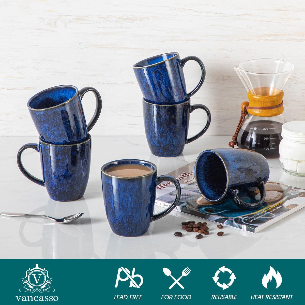 Vancasso Starry mugs arranged on table with blue glaze