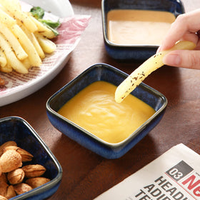Vancasso Stern dipping bowls signaling dishwasher-safe care for quick cleaning.