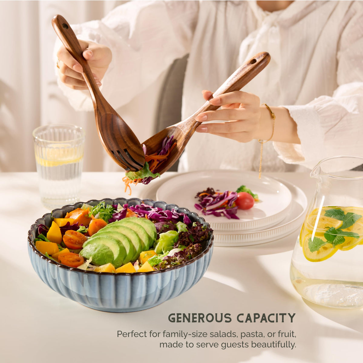 Vase and Vessel Tidal shell-shaped edge adds decorative flair for fruit.