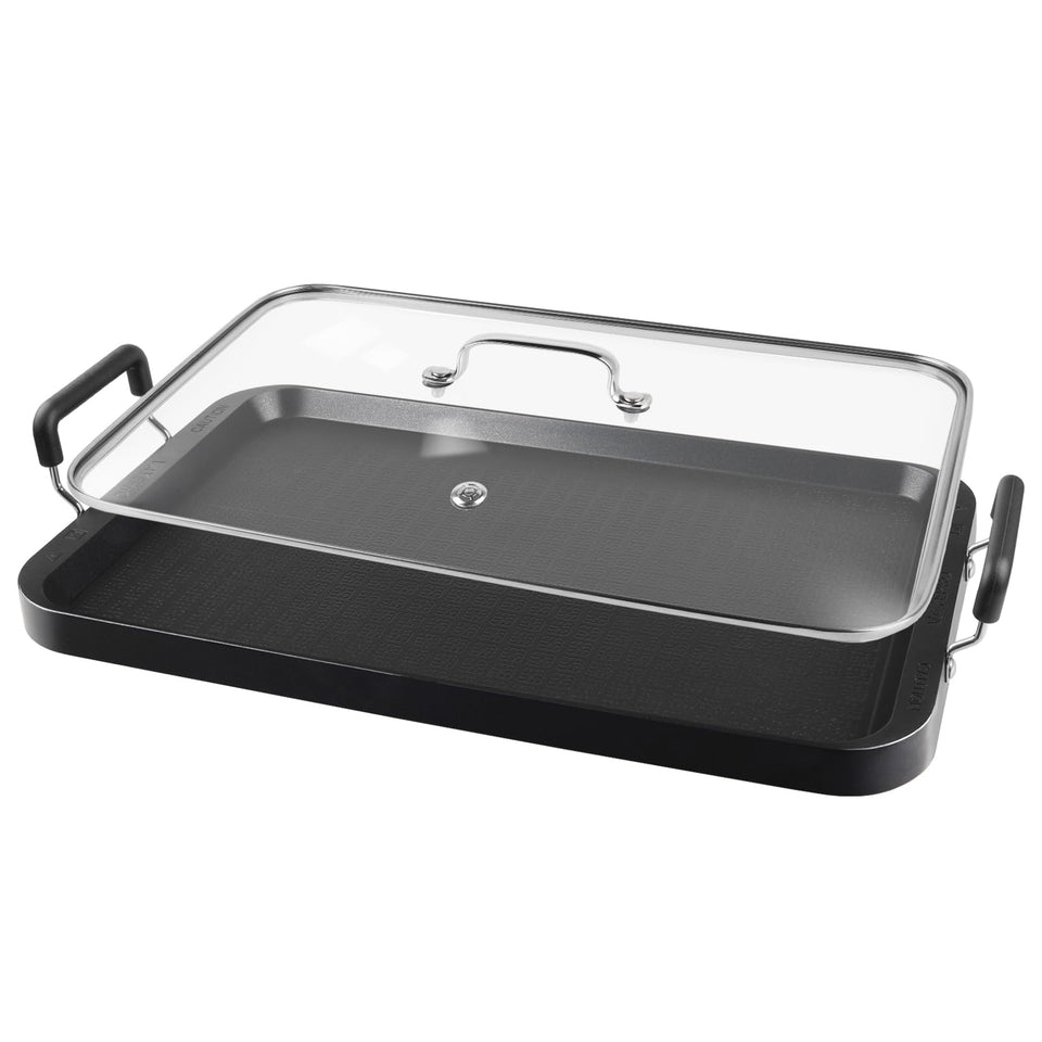 Vayepro two-burner griddle pan on a stove showing ample cooking space and heat control.