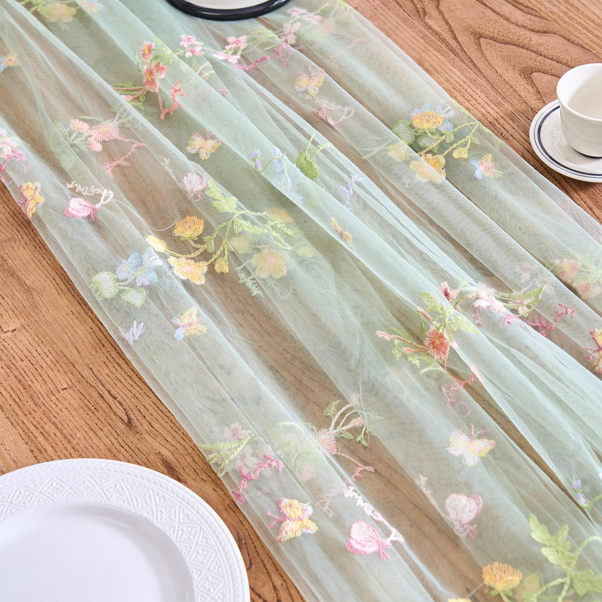 vctops sage green two-pack laid across large table for events.