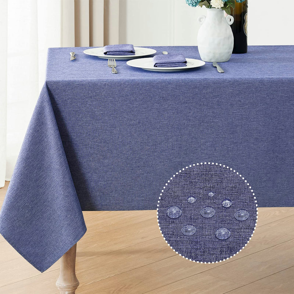 Veblandy denim blue rectangle tablecloth protects dining surfaces.