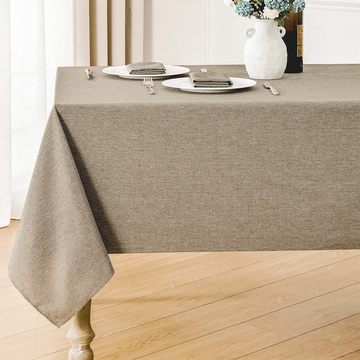 Veblandy rectangle tablecloth with linen texture enhances dining elegance and surface protection.