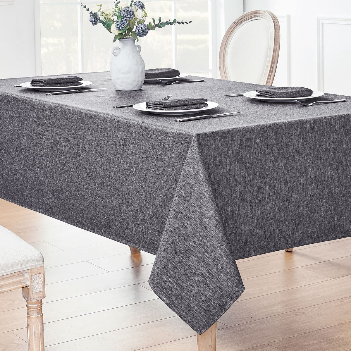 Outdoor patio dining with Veblandy tablecloth showing easy-clean performance.