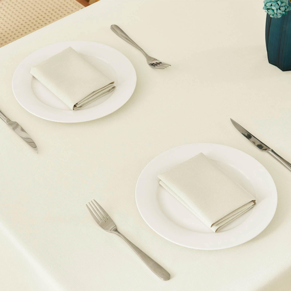 Veblandy ivory tablecloth with waterproof surface protects against spills.