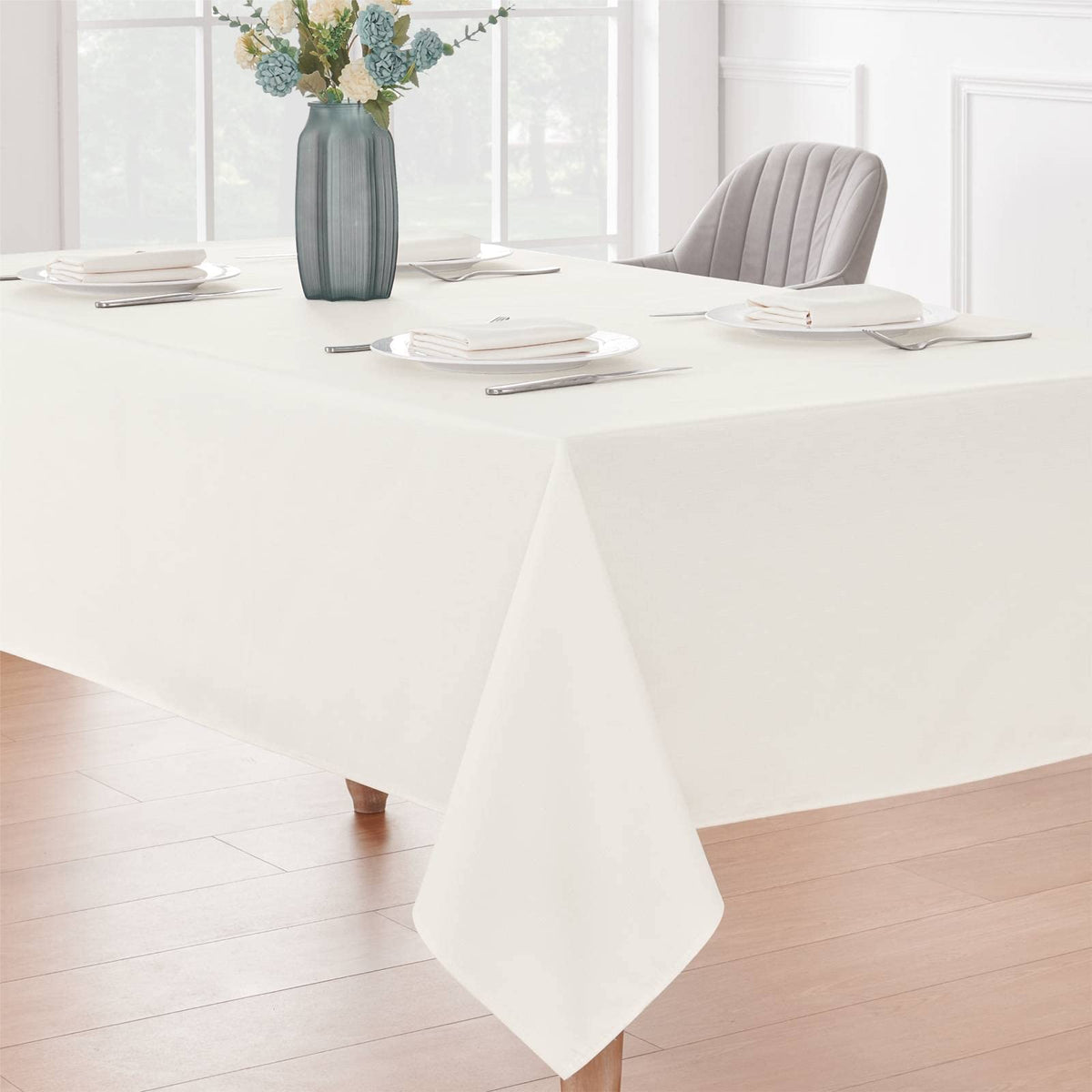 Veblandy 60x144 ivory tablecloth is machine washable for easy care.