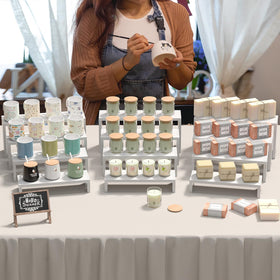 Vecxoty vendor booth dessert table display showcases treats with rustic farmhouse charm.
