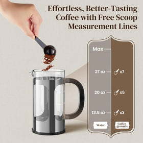Veken French press with exterior markings and included coffee scoop for precise brewing.