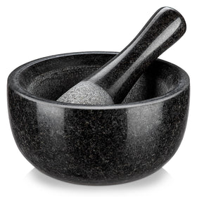 Velaze large mortar set on counter for grinding herbs.