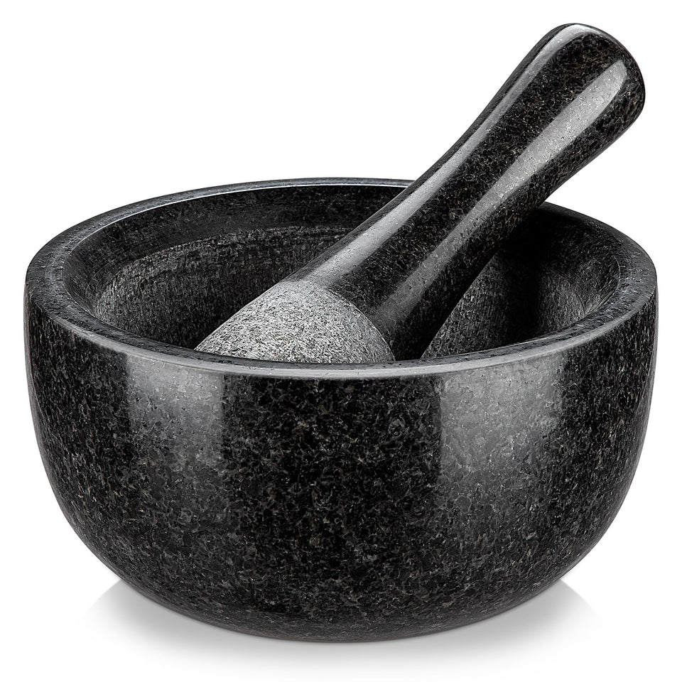 Velaze large mortar set on counter for grinding herbs.