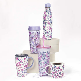 Travel-ready mug in cup holder-friendly tapered shape for commute.